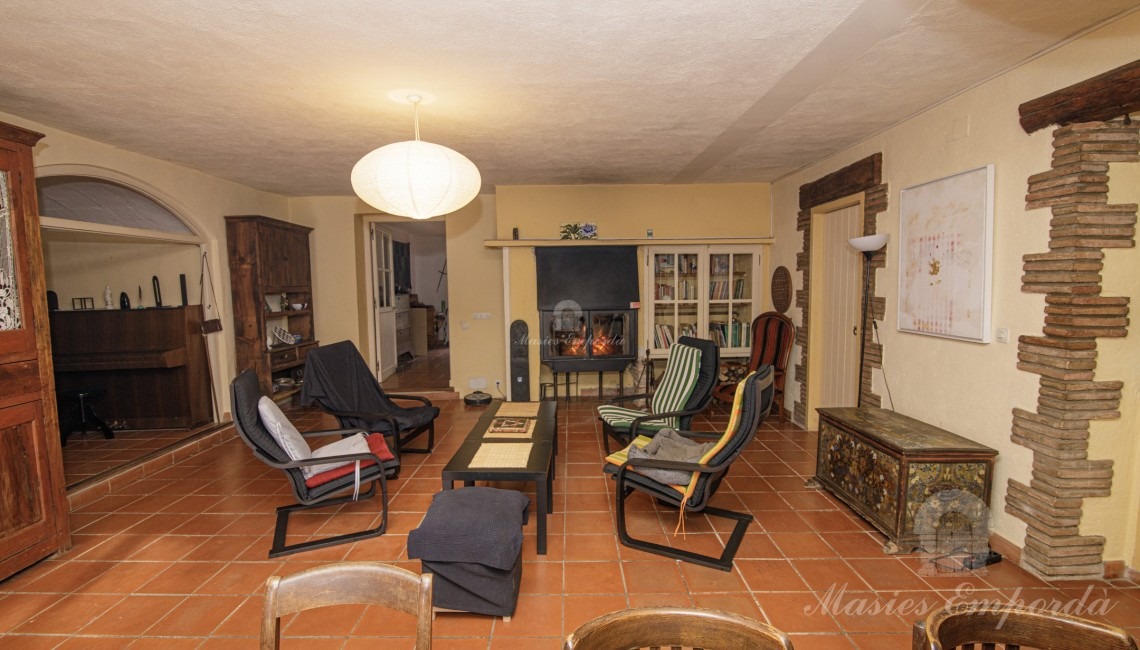 Living room, dining room and kitchen on the ground floor of the farmhouse. 