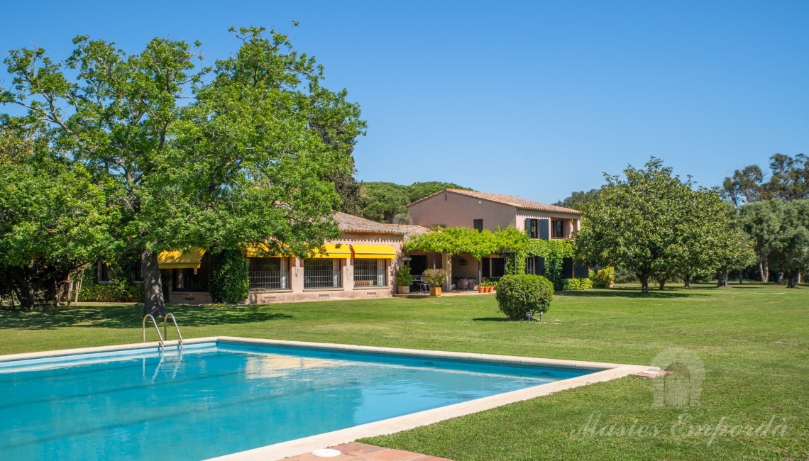 Views of the pool area with the pavilion in the background