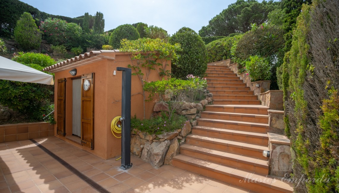 Stairs leading to the second entrance of the property