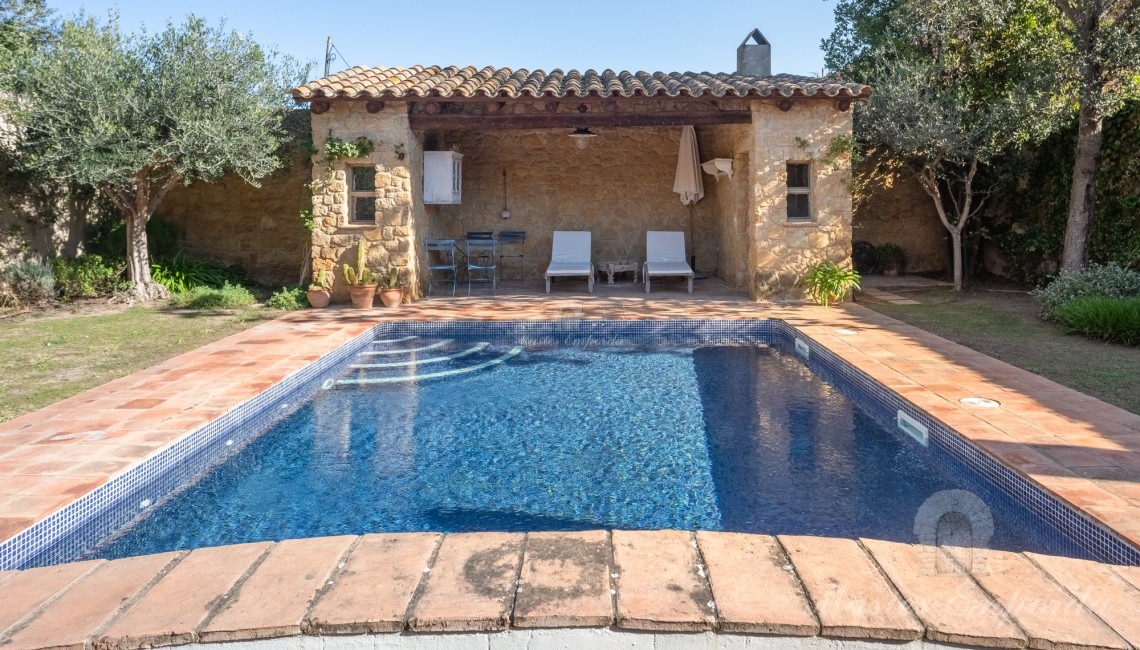 Kitchen overlooking the garden and pool