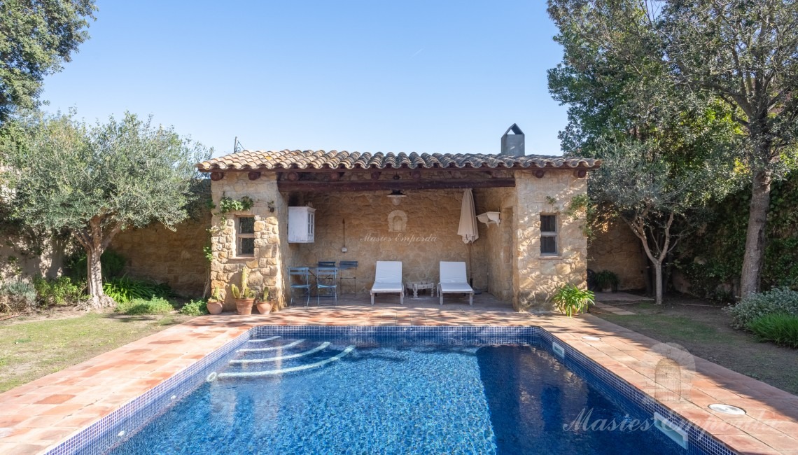 Kitchen overlooking the garden and pool