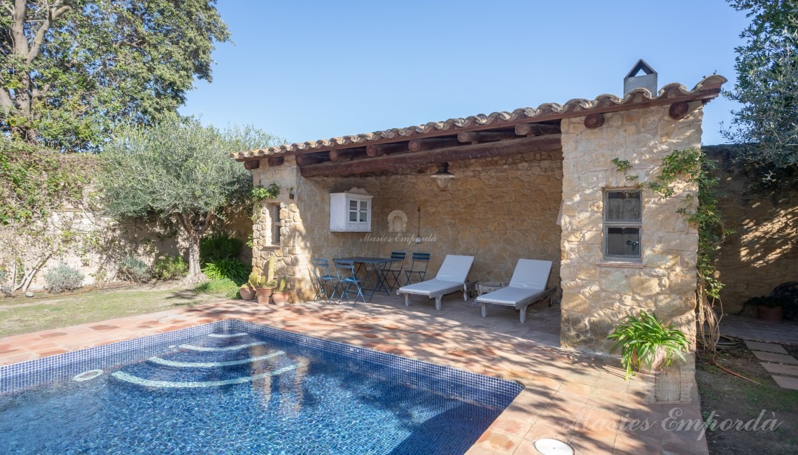 Kitchen overlooking the garden and pool