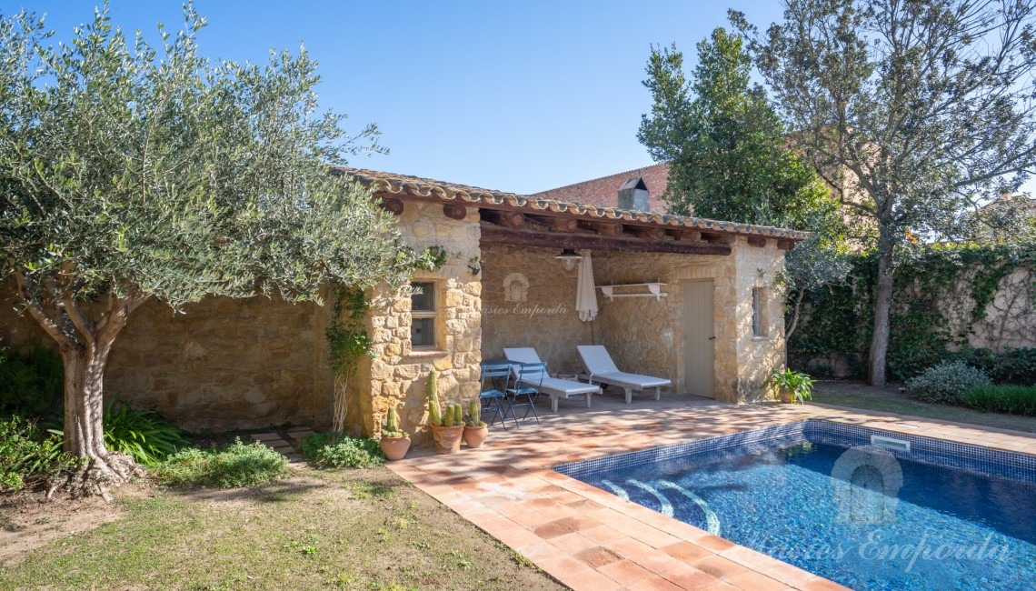 Kitchen overlooking the garden and pool