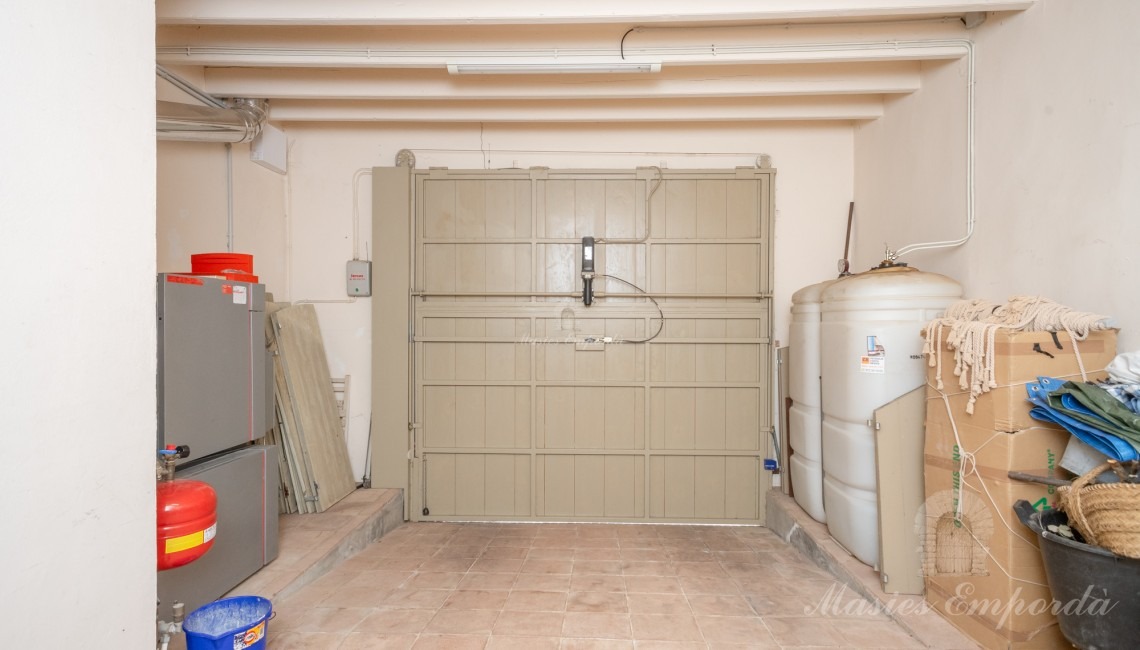 Garage on the ground floor of the house gas-oil tank and boiler