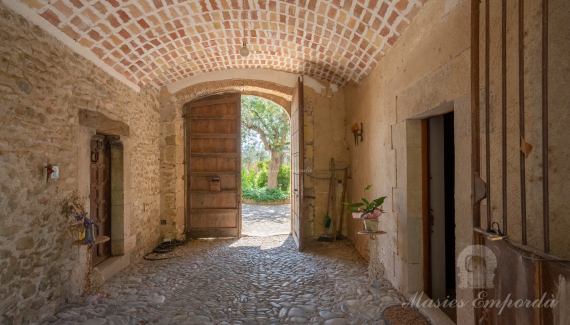 Entrance to the farmhouse and inside the garden 