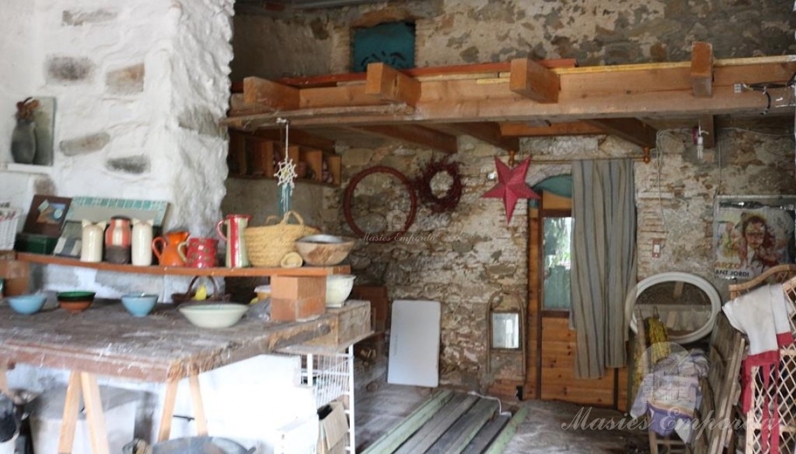 Kitchen-dining room with fireplace