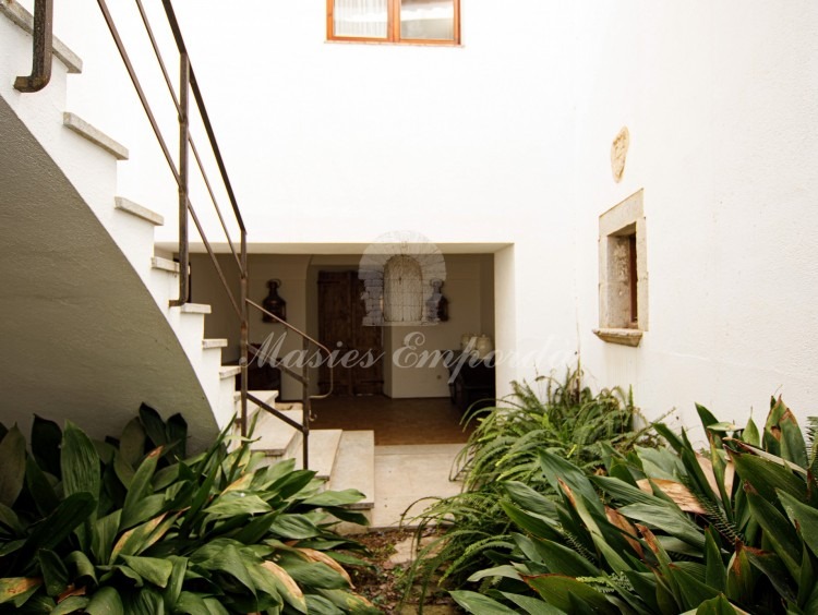 Interior courtyard of the house with access to the upper floors.