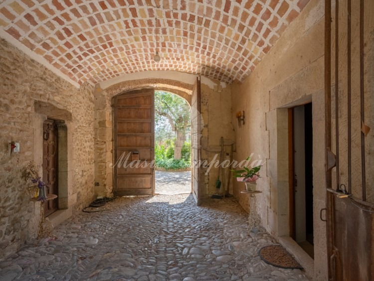 Entrance to the farmhouse and inside the garden 